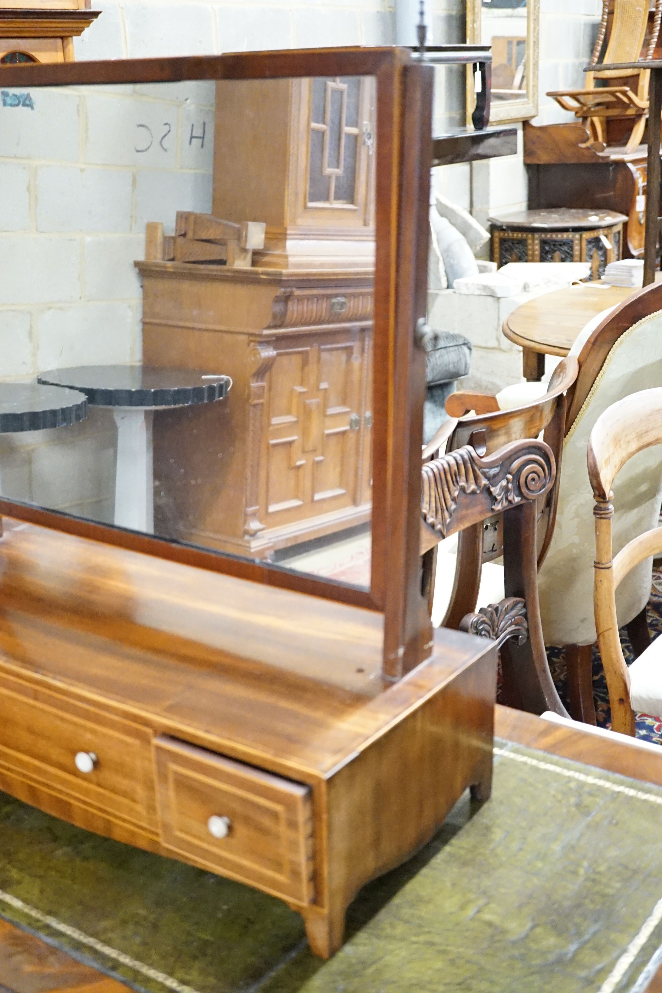 A Regency boxwood strung mahogany toilet mirror, width 62cm